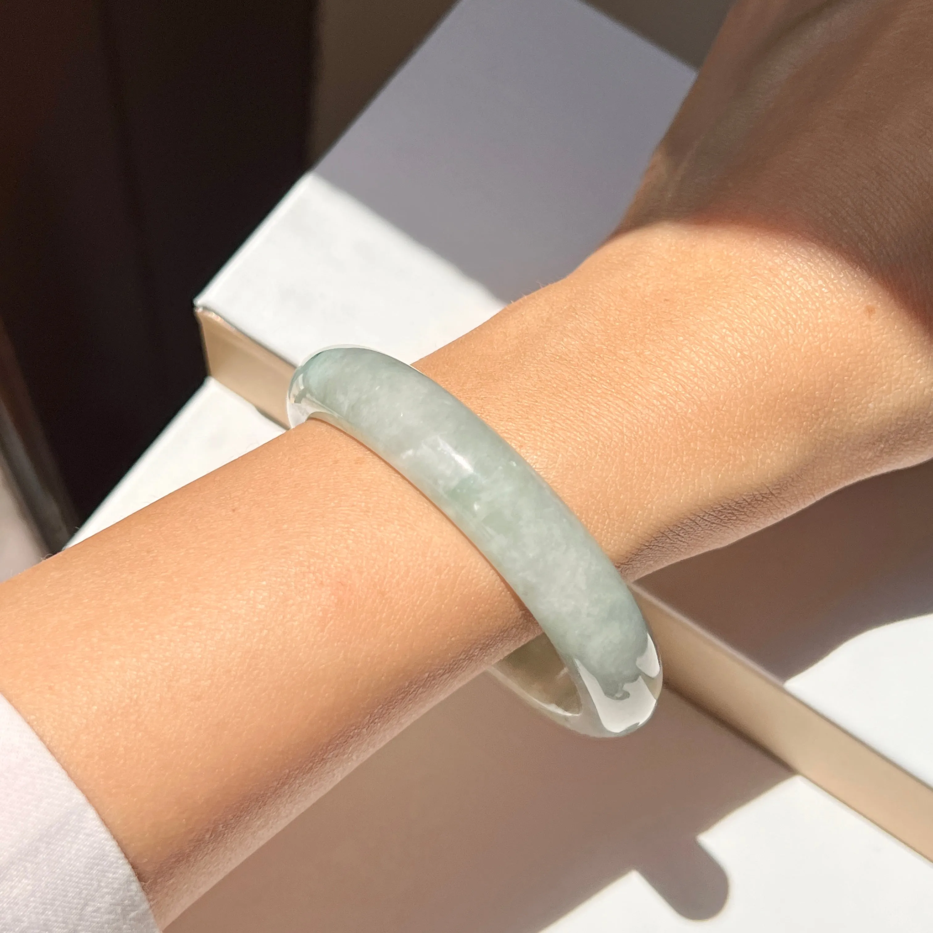 55.6mm A-Grade Natural Bluish Green Floral Jadeite Modern Oval Bangle No. 152002